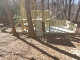 Fully Featured Playground with a large family deck