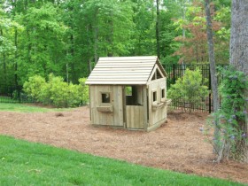 Large 6’ x 6’ Playhouse with extra headroom inside.