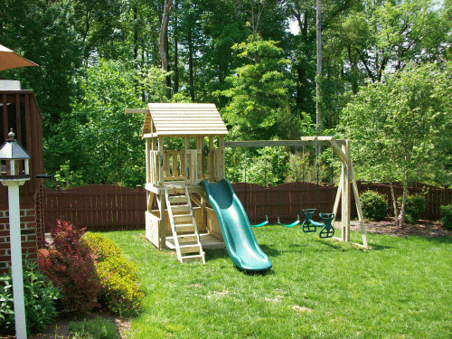 Super nice playset in Apex, 5x5, installed into small yard.