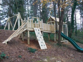 Great Playset installed beautifully on difficult terrain.
