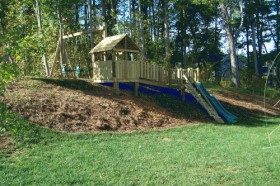 One of our coolest wooden playsets ever in Cary